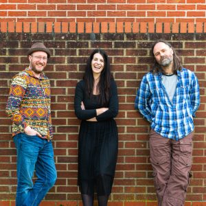 The Lost Trades promotional photo: three members posed against a wall.